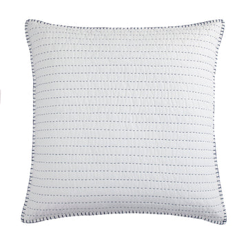 warm-toned soft pillow sham in a minimalist dining room setting