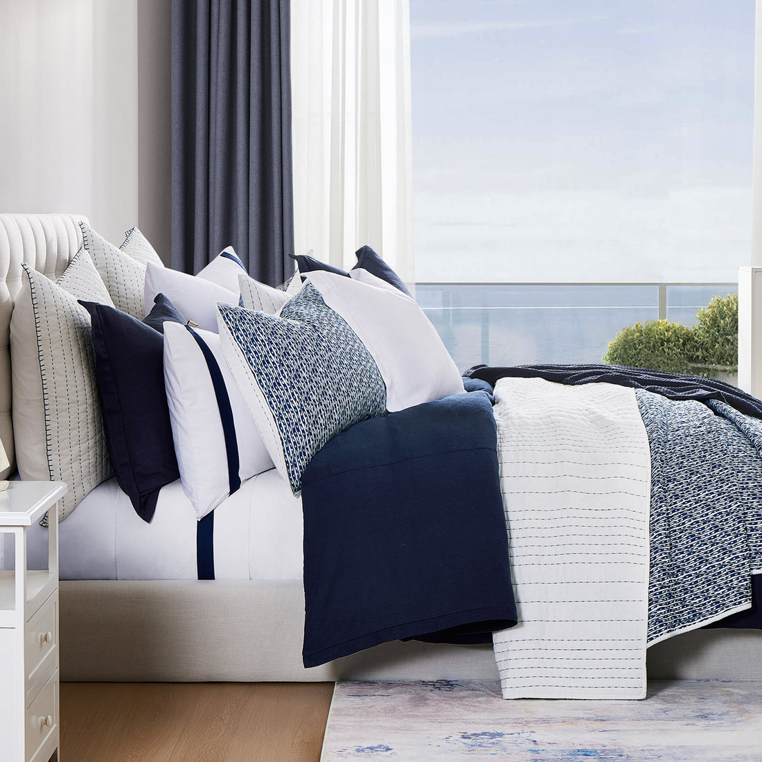 cream woven quilt in a elegant modern bedroom setting