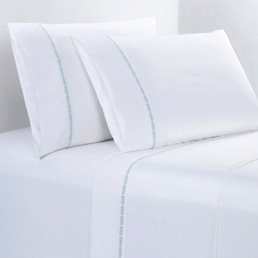 350TC Laurel Embroidered Border Sheet Set - Queen styled for a minimalist bedroom space.