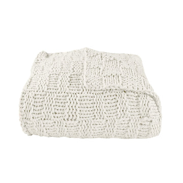 warm-toned soft throw in a classic entryway setting