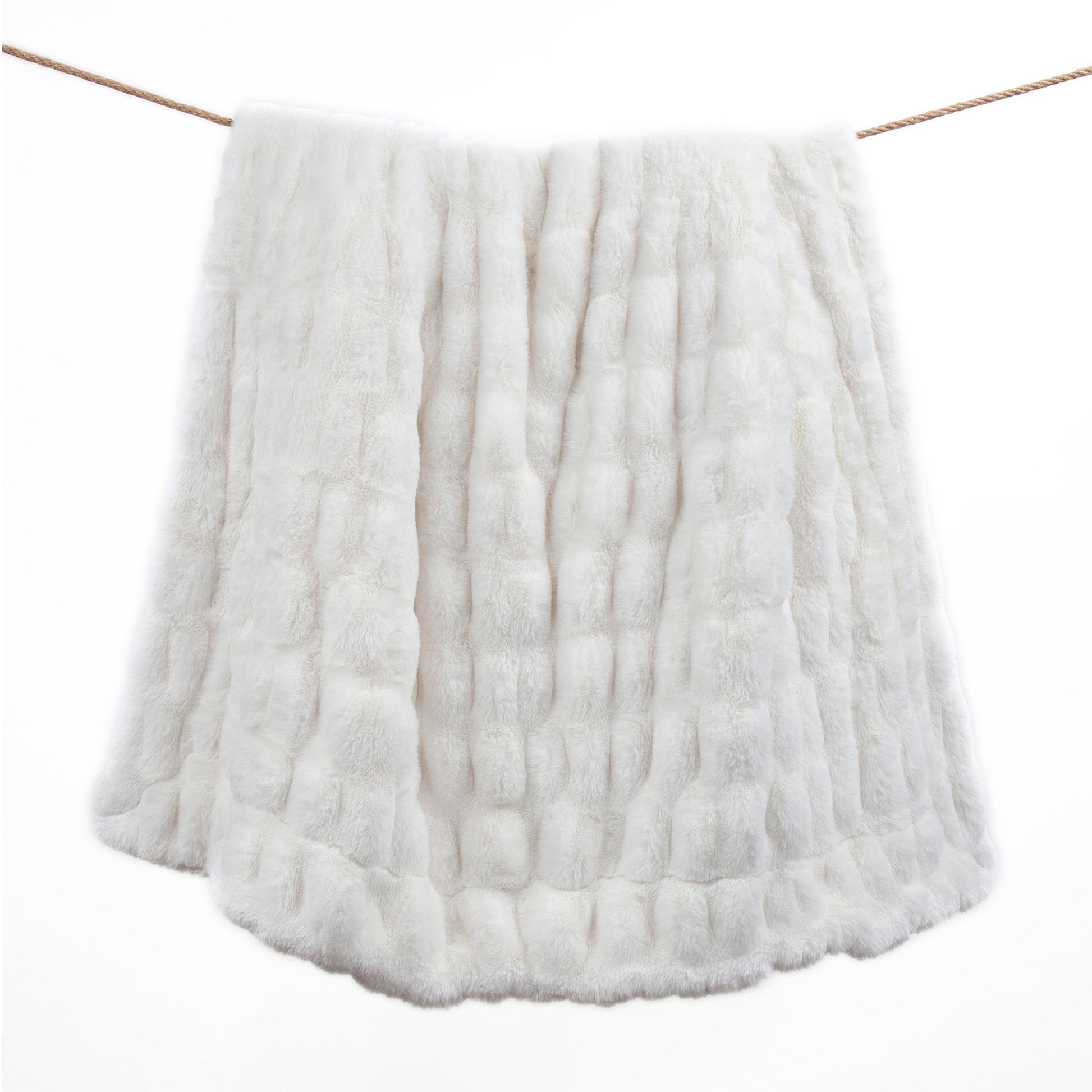 white brushed throw in a modern bedroom setting