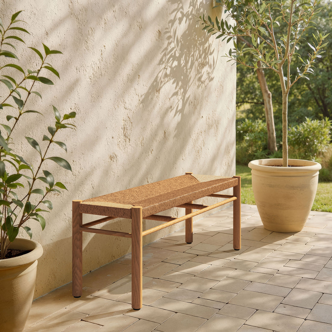 Iska Bench Natural styled for a transitional patio space.
