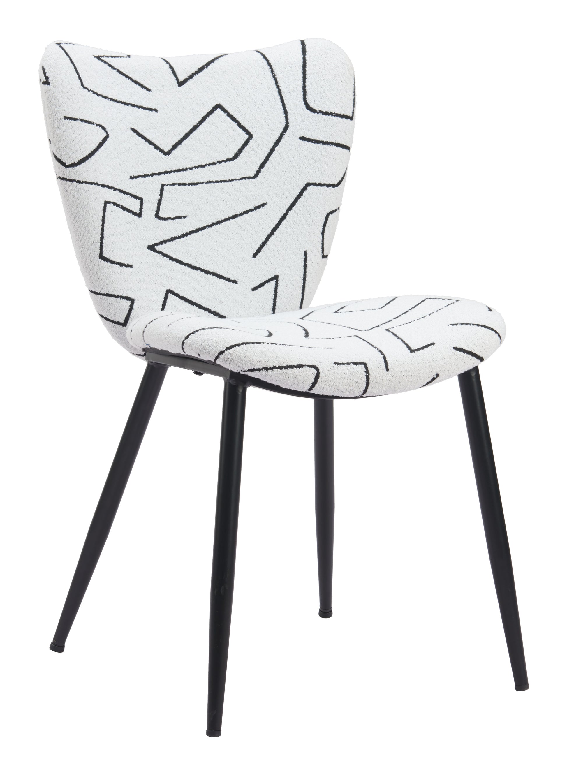 neutral linen accent chair styled in a coastal elegant dining room