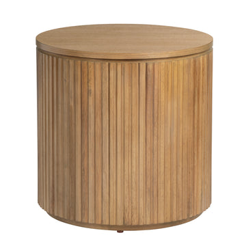 beige plush accent table in a modern bedroom setting