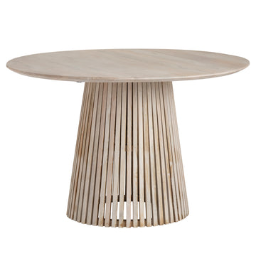 charcoal textured accent table in a minimalist dining room setting