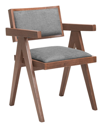 cream brushed metal accent chair styled in a contemporary minimalist entryway