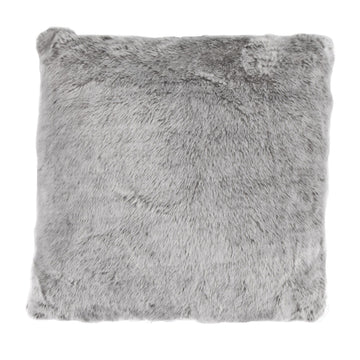 warm-toned brushed metal pillow sham styled in a contemporary minimalist entryway