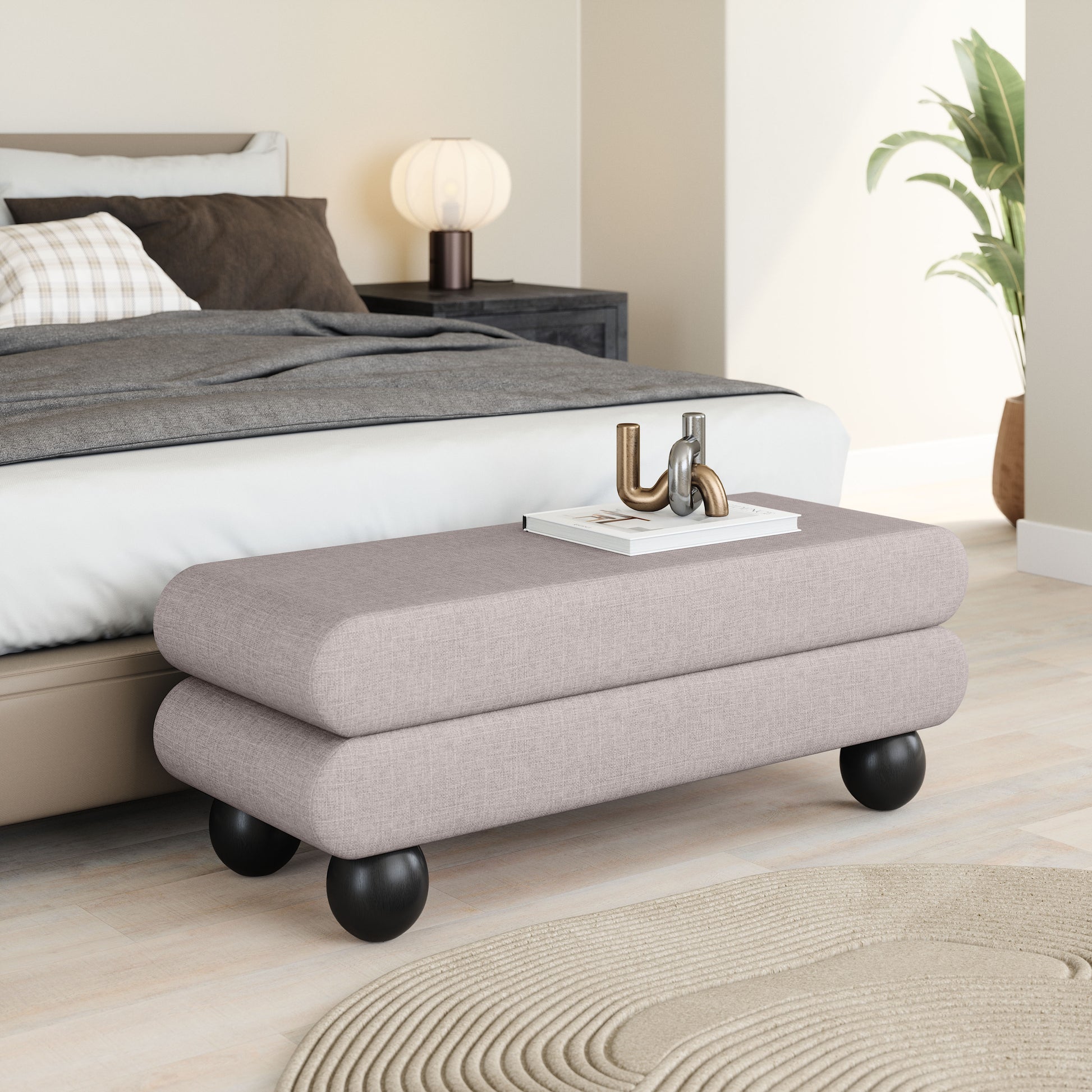 ivory cotton accent bench in a elegant modern bedroom setting