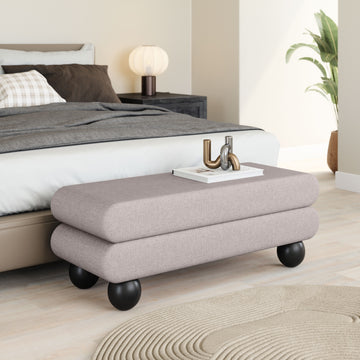 ivory cotton accent bench in a elegant modern bedroom setting