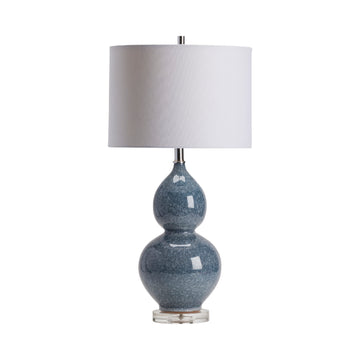 beige plush table lamp in a refined master bedroom setting