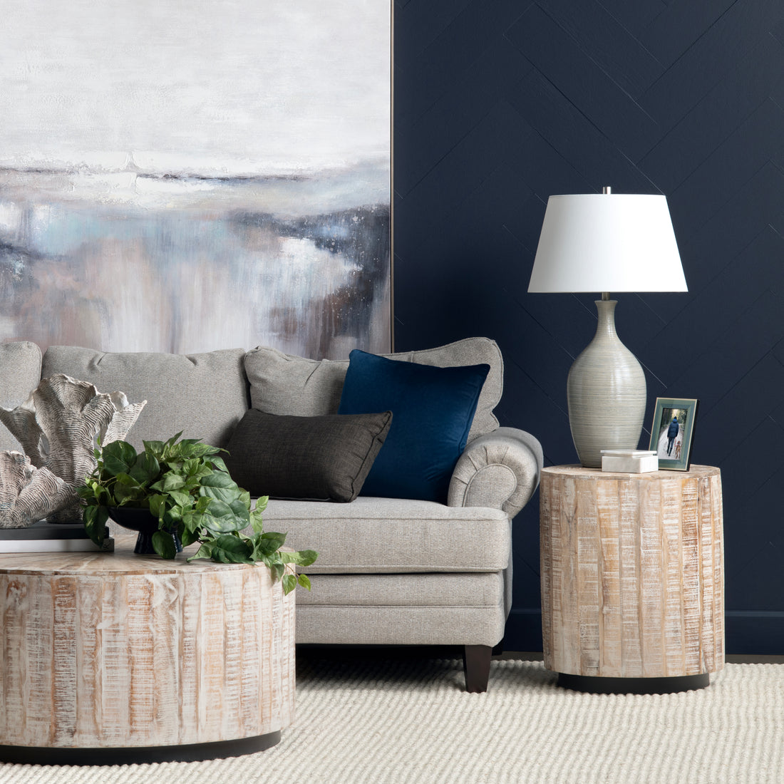 ivory cotton accent table in a farmhouse contemporary bedroom setting