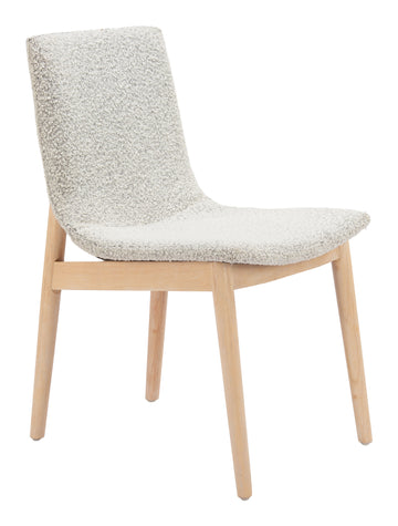 warm-toned brushed metal accent chair styled in a contemporary minimalist entryway