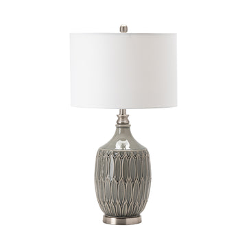 cream woven table lamp in a minimalist dining room setting
