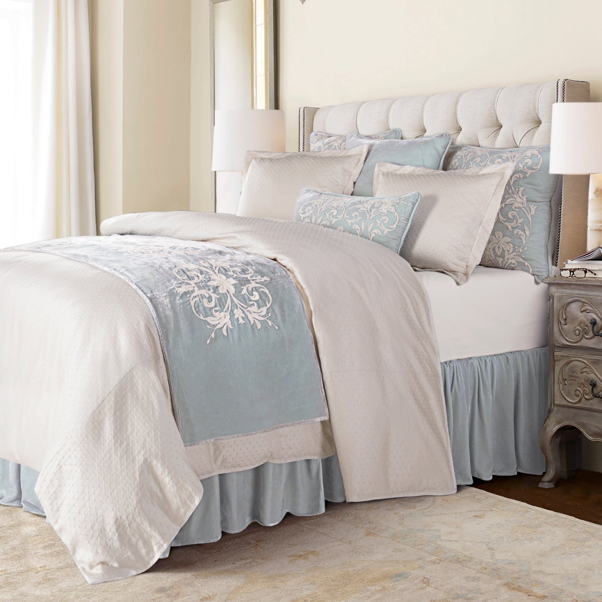 warm-toned brushed metal comforter set styled in a mid-century minimalist entryway