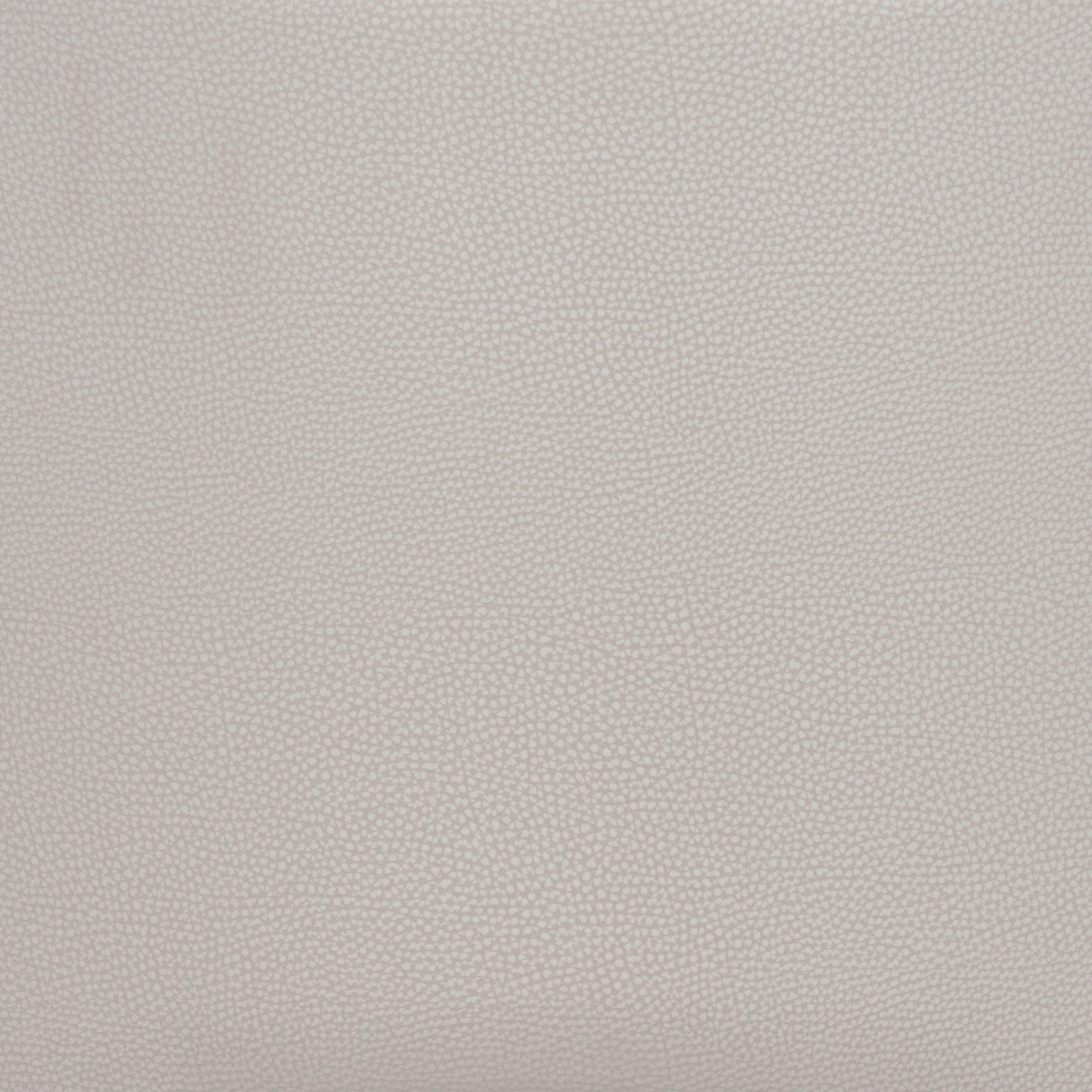 Close-up texture swatch of the beige faux leather material used on the Brew Counter Stool.