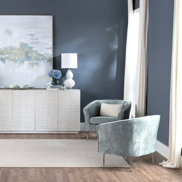 warm-toned soft accent chair in a classic entryway setting