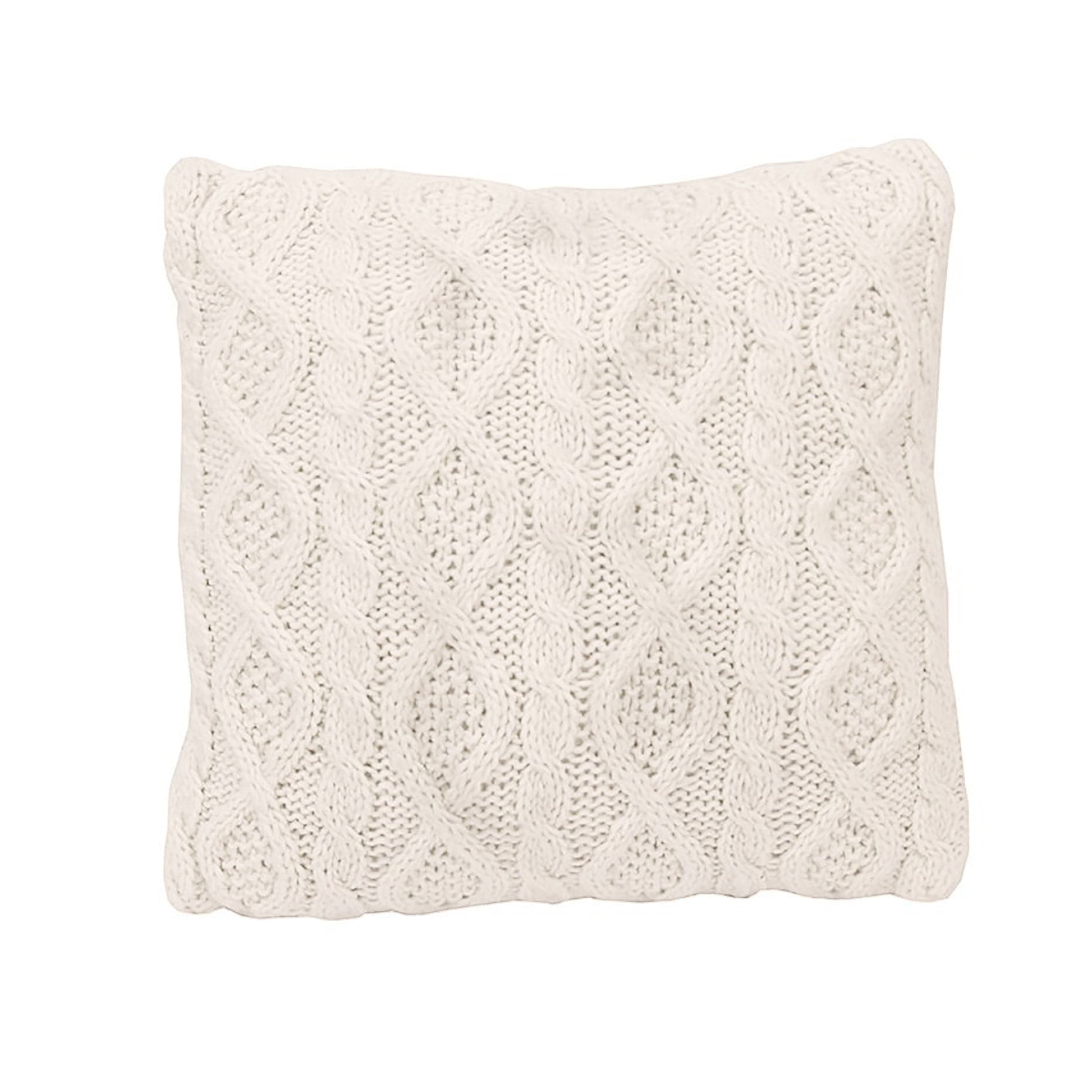 Knitted cream pillow on a white background