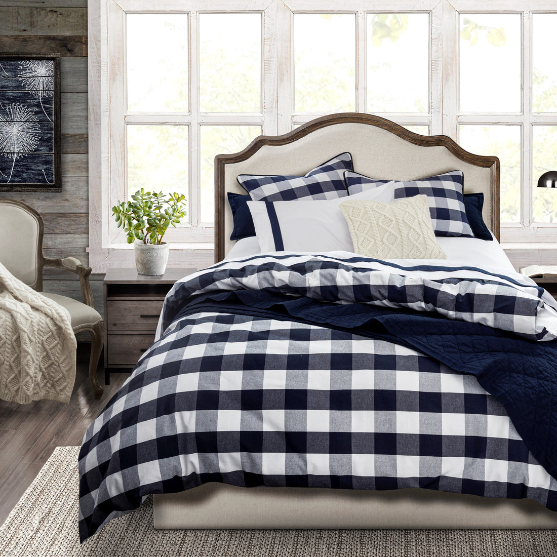 cream brushed metal duvet cover styled in a mid-century minimalist entryway