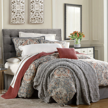 charcoal brushed metal comforter set styled in a mid-century minimalist entryway