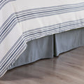 walnut linen bed frame styled in a coastal elegant dining room