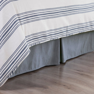 walnut linen bed frame styled in a coastal elegant dining room