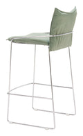 back angle side of green dining chair with metal frame on a white background