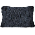 Textured dark gray pillow on a white background