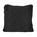 Dark gray textured pillow on a white background