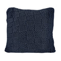Navy blue textured pillow on a white background