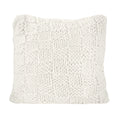 Textured white pillow on a white background