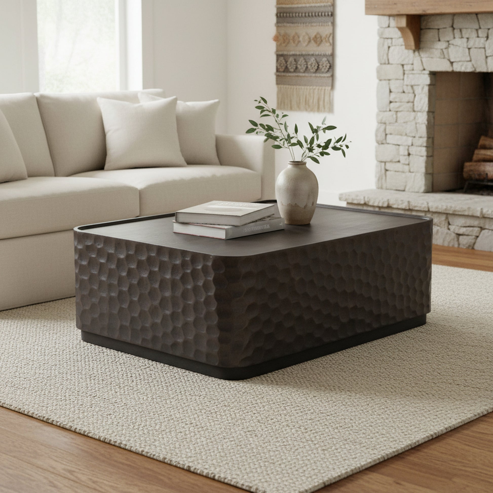 gray canvas accent table in a coastal guest room setting