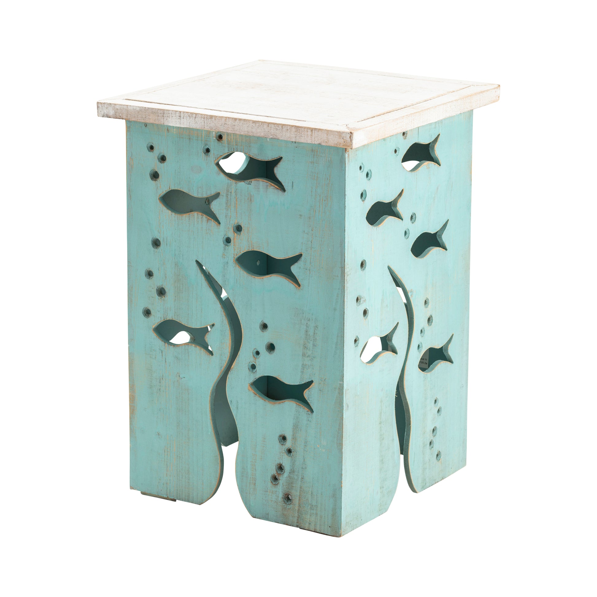 gray canvas accent table in a coastal guest room setting