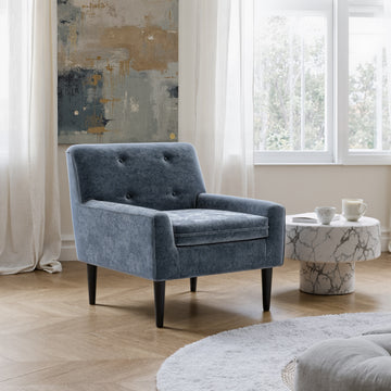 earth-toned fabric accent chair in a contemporary cozy bedroom setting