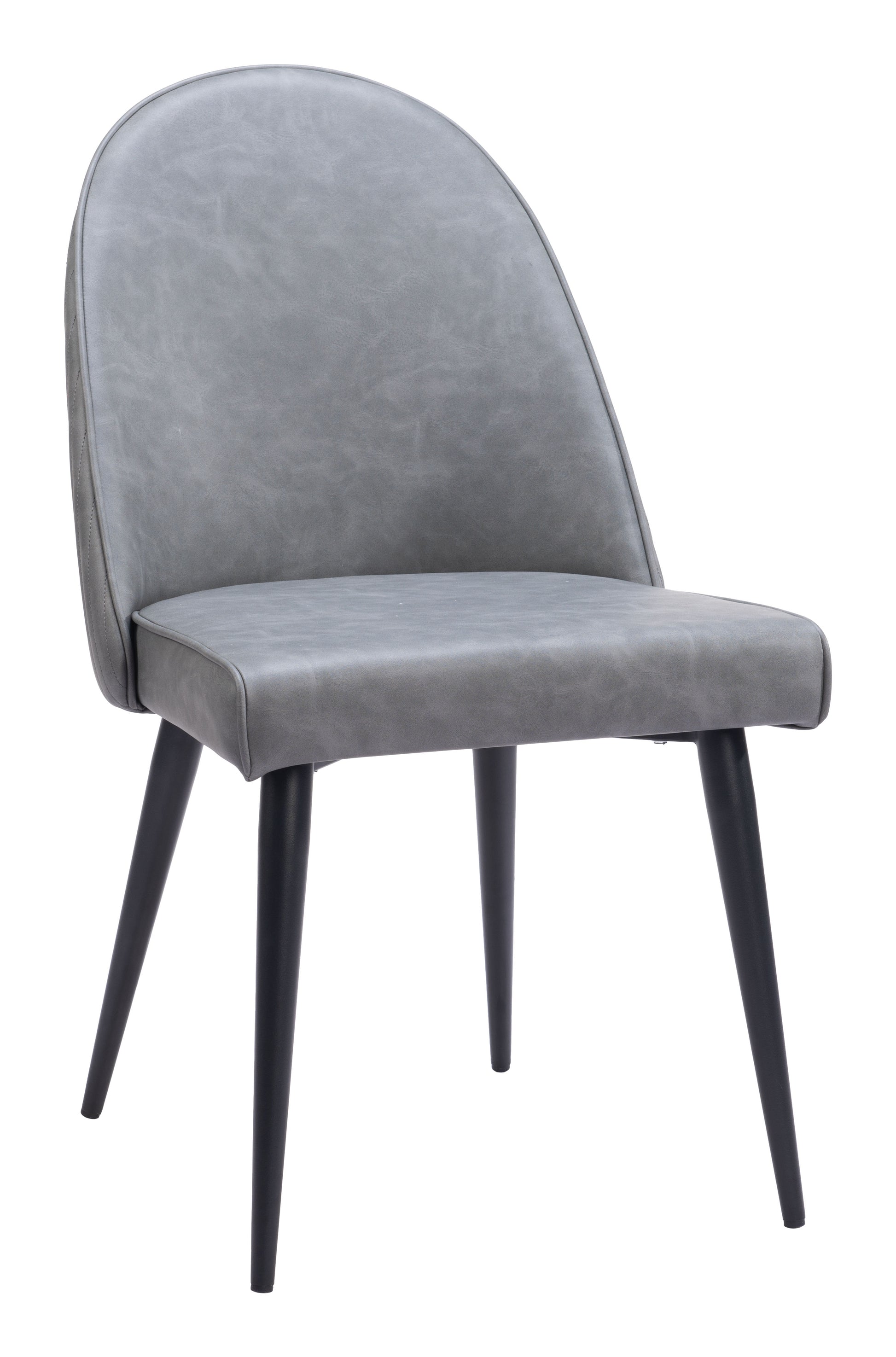 matte black linen accent chair styled in a minimalist elegant dining room