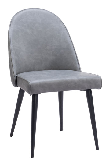 matte black linen accent chair styled in a minimalist elegant dining room