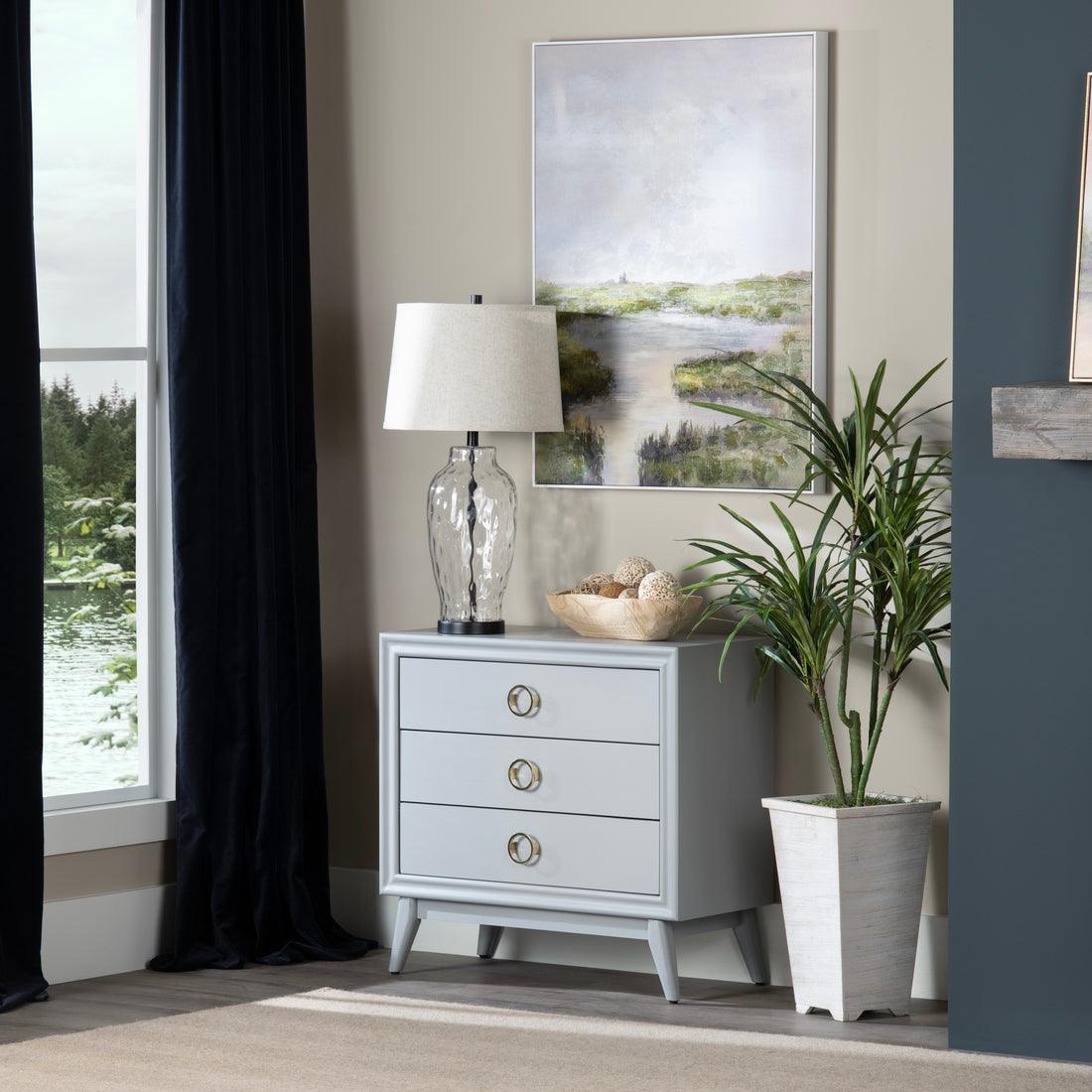 gray canvas home décor piece in a coastal guest room setting