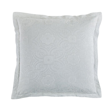 neutral linen pillow sham styled in a minimalist elegant dining room