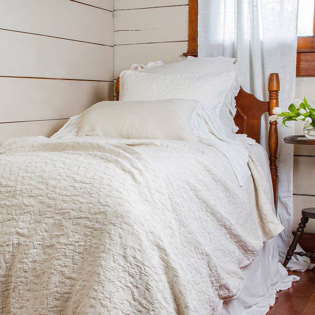 ivory solid wood duvet cover styled in a modern modern living room