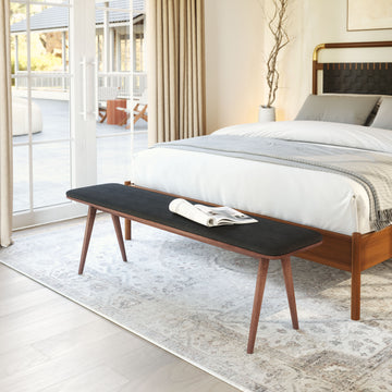 warm-toned soft accent bench in a coastal guest room setting