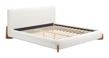 neutral linen bed frame styled in a minimalist elegant dining room