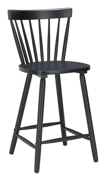 warm-toned brushed metal stool styled in a contemporary minimalist entryway