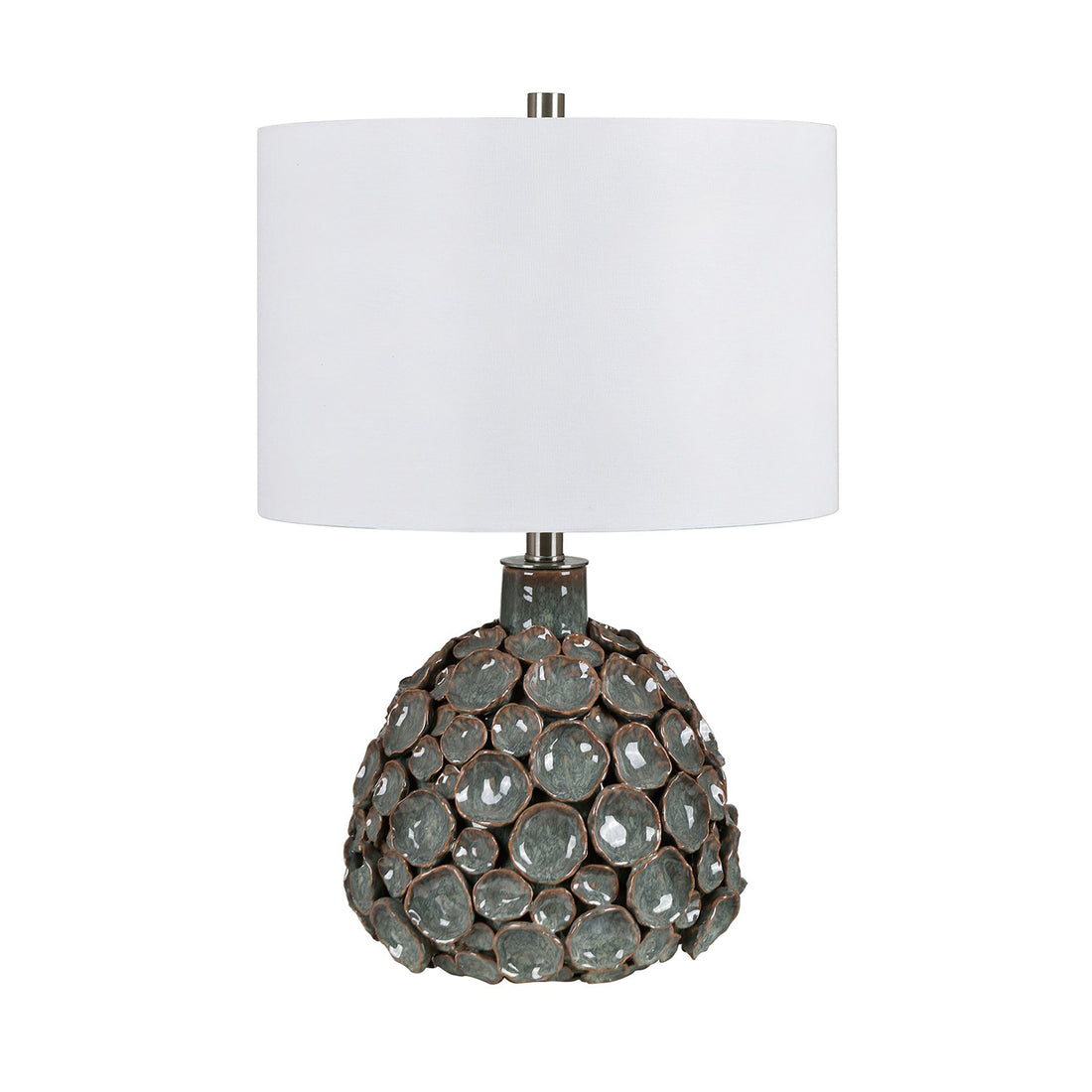 ivory cotton table lamp in a coastal guest room setting