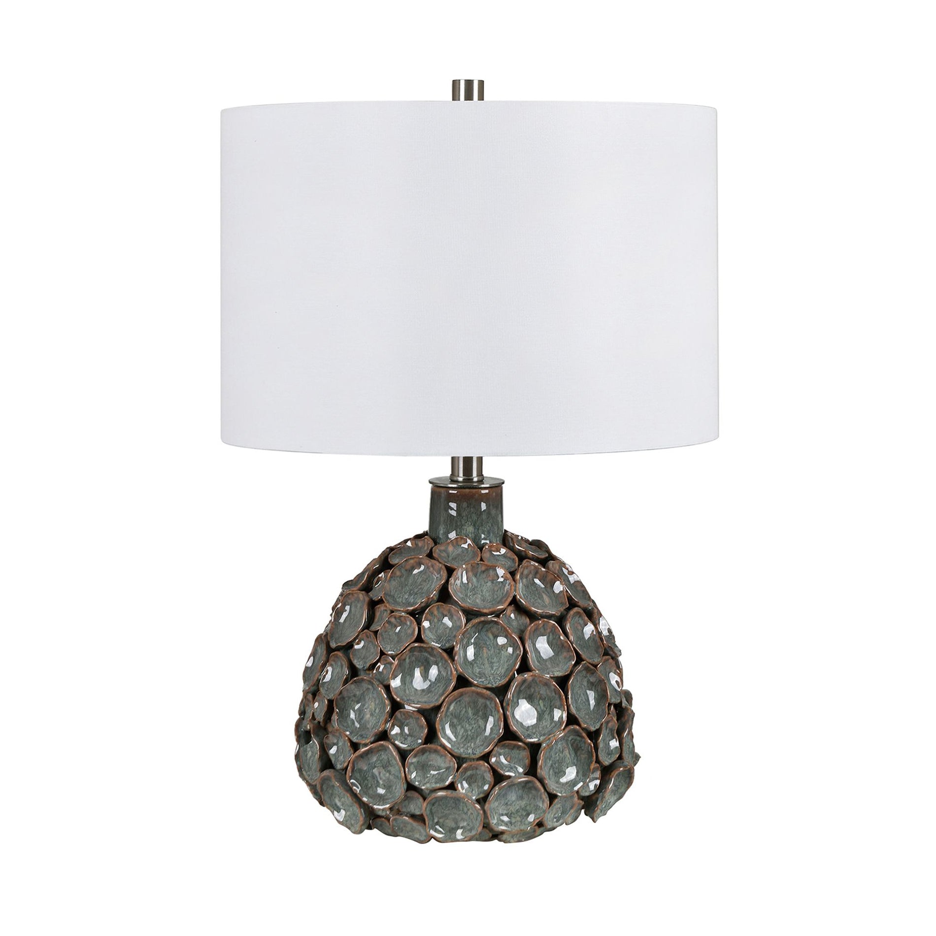ivory cotton table lamp in a coastal guest room setting