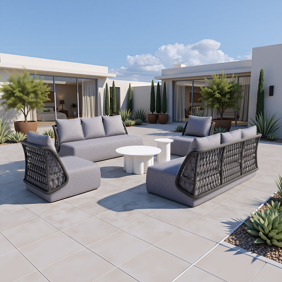 Mekan Sofa Gray styled for a transitional patio space.