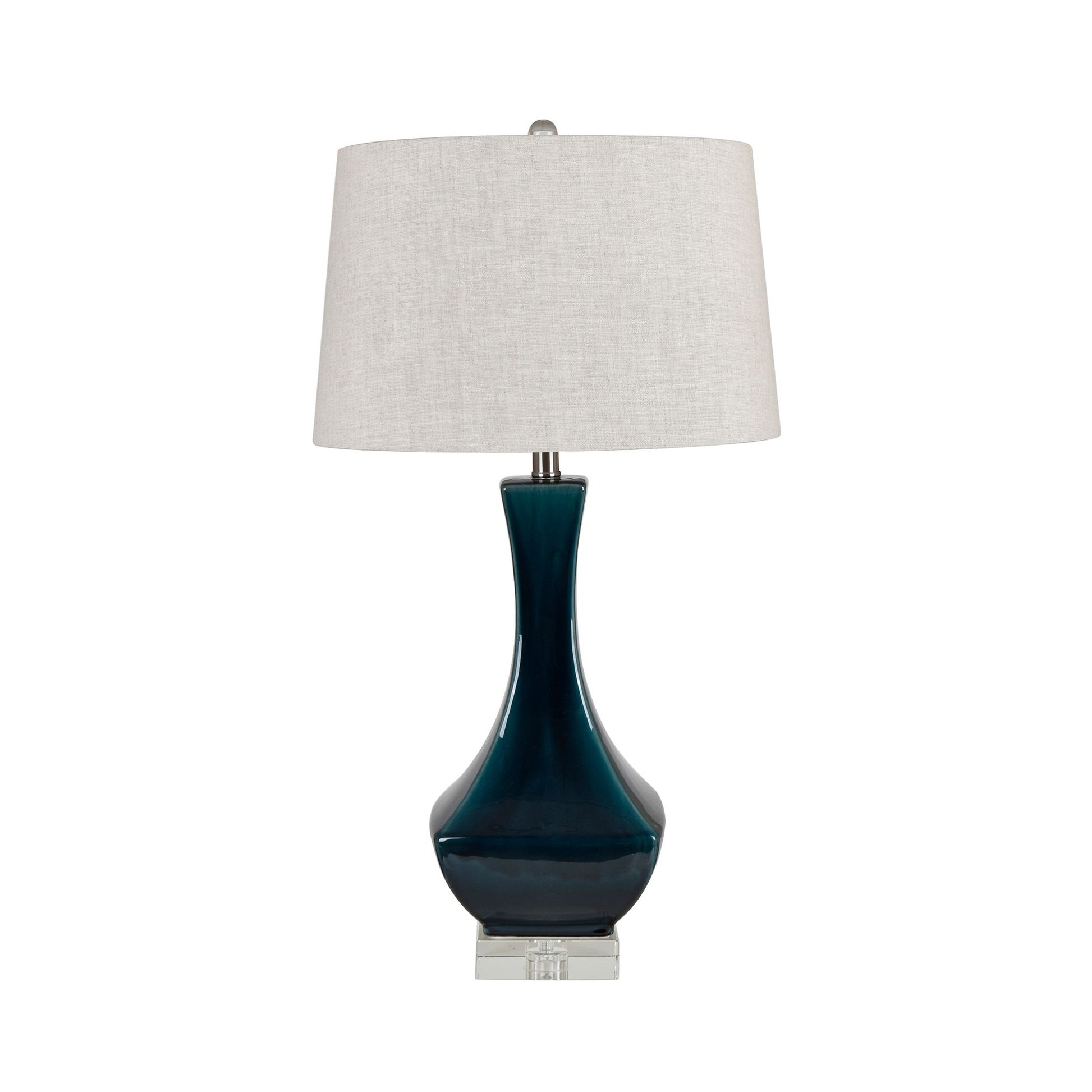 ivory cotton table lamp in a elegant modern bedroom setting