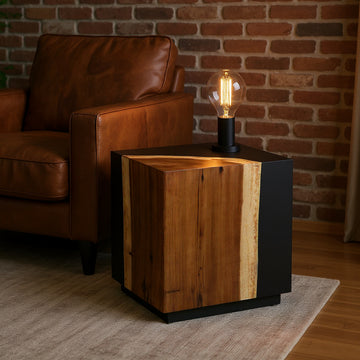 charcoal textured accent table in a minimalist dining room setting