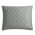 Gray quilted pillow on a white background
