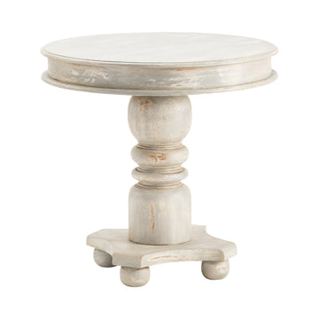 beige plush accent table in a farmhouse contemporary bedroom setting
