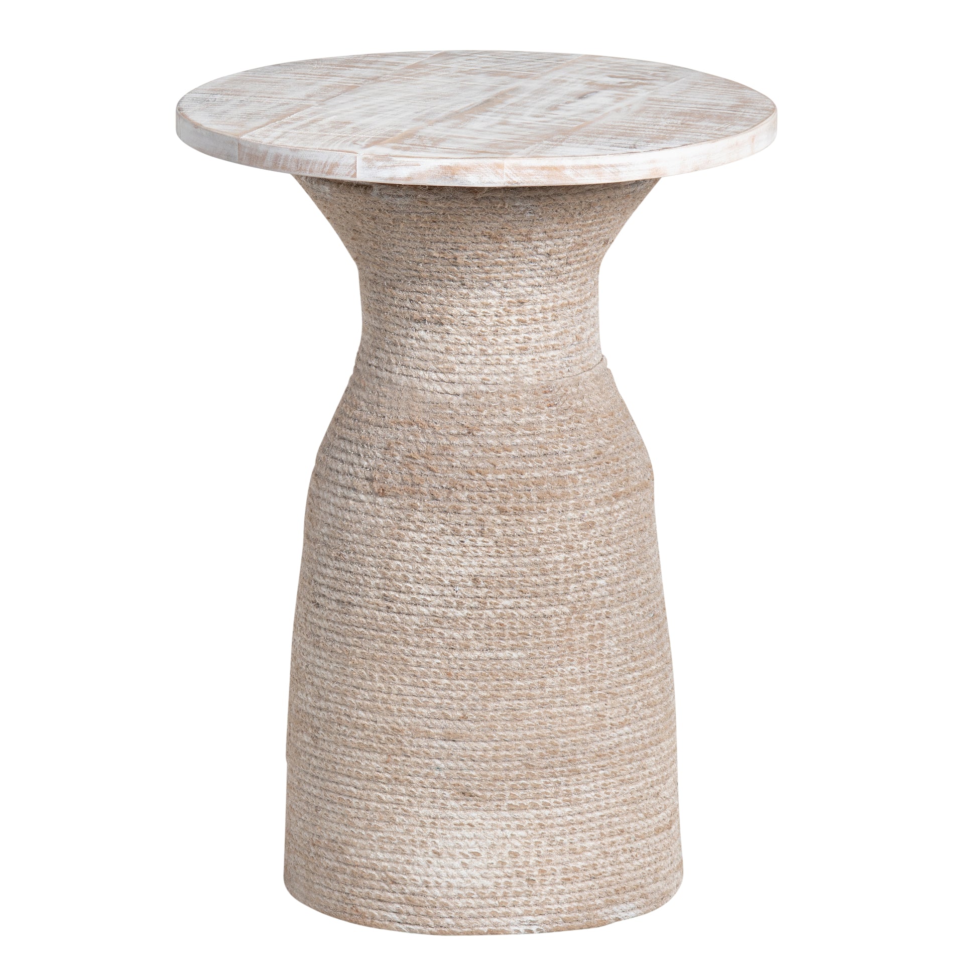 cream woven accent table in a minimalist dining room setting