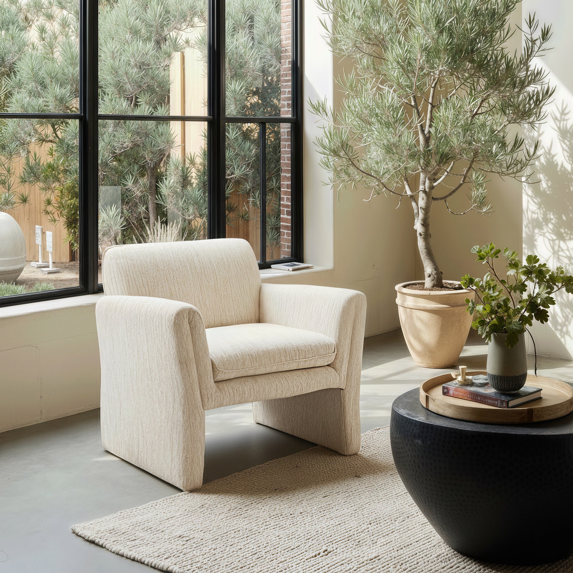 natural velvet accent chair in a minimalist dining room setting